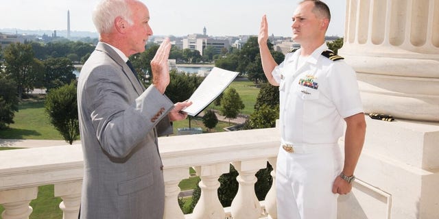 Rep. Joe Courtney and Lt. Jonathan Cebik at Cebik's promotion ceremony.