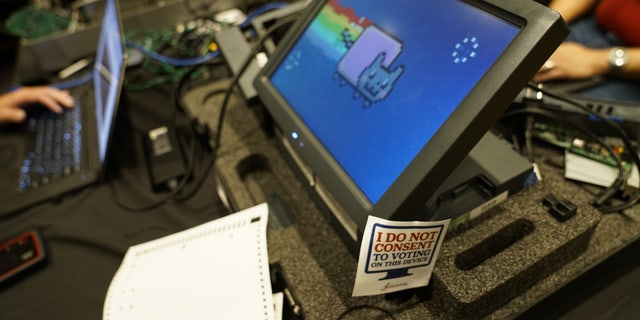 A square of U.S. elections apparatus is hacked during a DEF CON 27 Voting VIllage in Las Vegas to uncover an charcterised Nyan Cat, among other things.(Fox News)