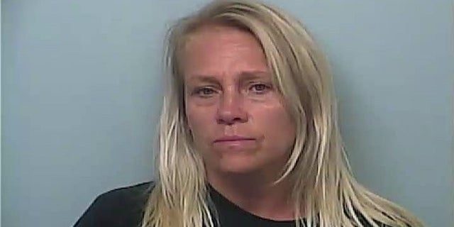 Destiny Jene Terry, 44, was arrested for her role in the murder of Daniel Lee Upton in Florida. Escaped Prison inmate Stephen Michael Smith, 34, is suspected in the killing.