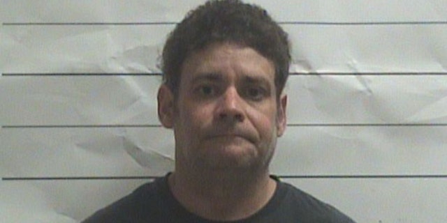 In a news release, New Orleans police spokesman Aaron Looney said 46-year-old David Hale was apprehended early Wednesday and booked on suspicion of second-degree battery and simple battery.