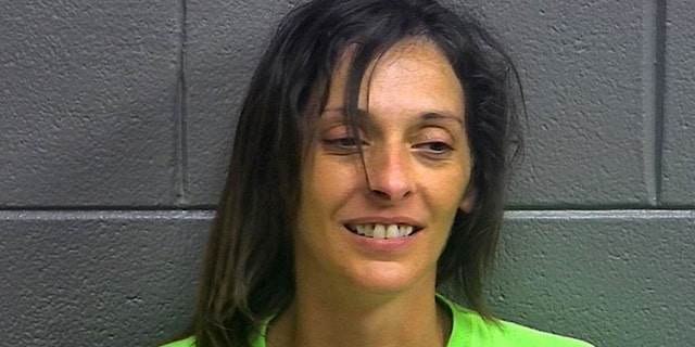 Donna Martin, 35, was charged with burglary and public intoxication after police say she broke into a bar before it opened on Monday.