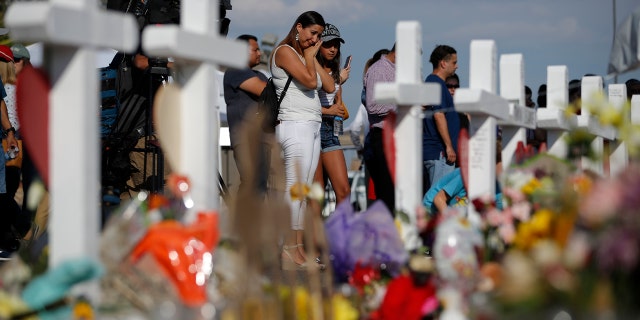 El Paso shooting Walmart employee helped up to 100 escape, says he was 'trained the customers come first' 4 People visit a makeshift memorial, Monday, Aug. 5, 2019, at the site of a mass shooting at a shopping complex, in El Paso, Texas.