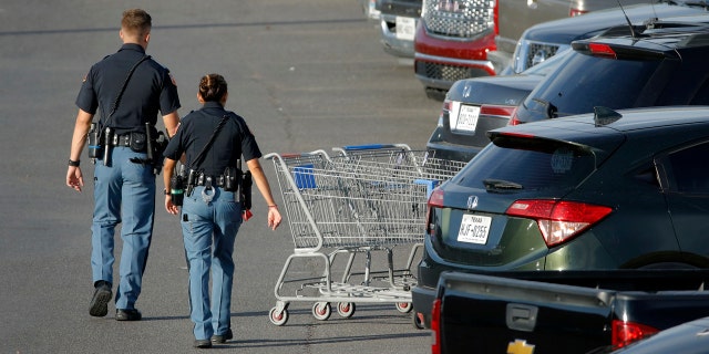 El Paso shooting Walmart employee helped up to 100 escape, says he was 'trained the customers come first' 3 Police officers walk by shopping carts at the scene of a mass shooting at a shopping complex Sunday, Aug. 4, 2019, in El Paso, Texas.