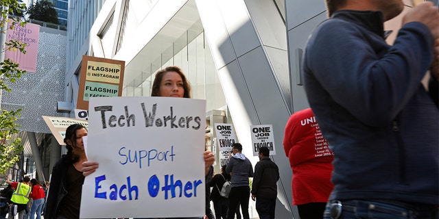Technicians marching in San Francisco last month to support Facebook's cafeteria staff. (AP Photo / Samantha Maldonado)