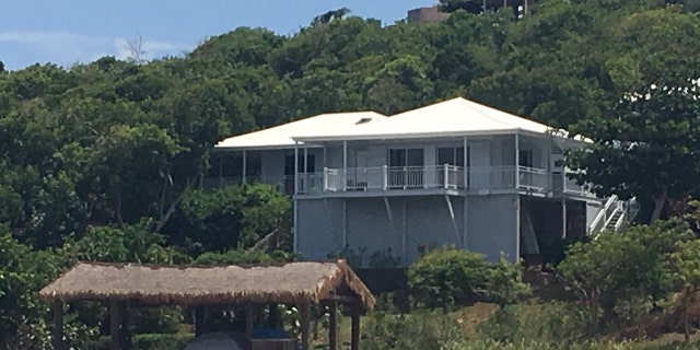 A slate gray and white building on Jeffrey Epstein's Great St. James Island. The disgraced financier bought the island in 2016 for $18 million. (Barnini Chakraborty/Fox News)