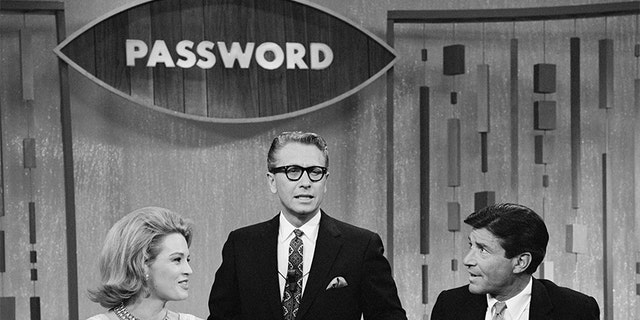 Angie Dickenson and Efrem Zimbalist, Jr. join host Allen Ludden (center) on the CBS game show "Password," on Jan. 13, 1965. (Photo by CBS via Getty Images)