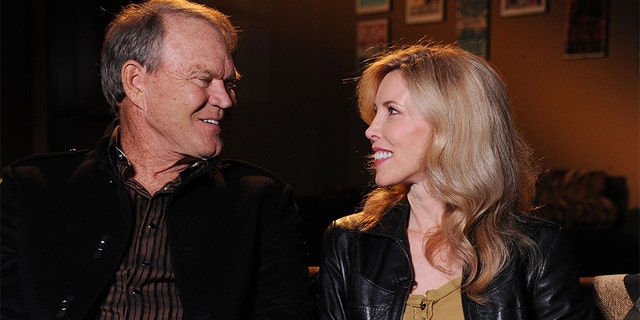 Glen Campbell and Kim Woollen sit down for an interview with CMT at the Bridgestone Arena on September 19, 2011, in Nashville, Tennessee. (Photo by Rick Diamond/Getty Images)