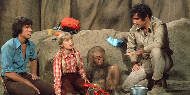 Wesley Eure as Will Marshall, Kathy Coleman as Holly Marshall, Philip Paley as Cha-Ka, Spencer Milligan as Rick Marshall.