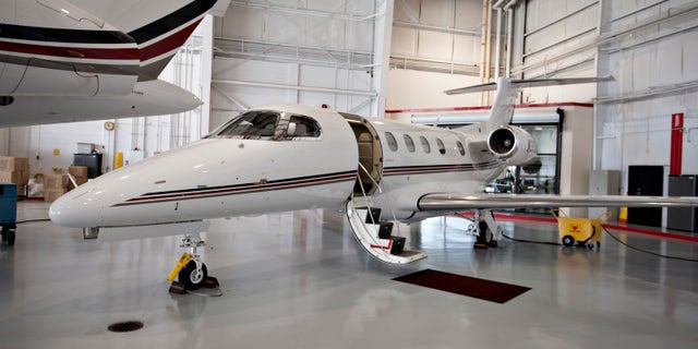 An external shot of a NetJets Inc. Embraer Phenom 300. NetJets, the aviation business of Berkshire Hathaway, is a fractional-jet company whose clients take a stake in planes in exchange for flight hours.
