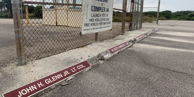 Some historic launch pads in Cape Canaveral appear frozen in time. Astronaut John Glenn, the first American to orbit the Earth, still has a labeled parking space at the entrance to Launch Compex 14.