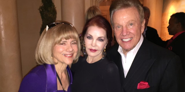 Wink Martindale (right) with Priscilla Presley (center) and the game show host's wife Sandy.