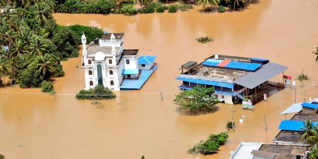 A flooded area of Malappuram district, Kerala as seen from an Indian Navy helicopter Sunday.