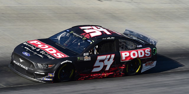 JJ Yeley, driver of the #54 PODS Ford, qualifies for the Monster Energy NASCAR Cup Series Bass Pro Shops NRA Night Race at Bristol Motor Speedway Friday in Bristol, Tennessee. (Photo by Jared C. Tilton/Getty Images)
