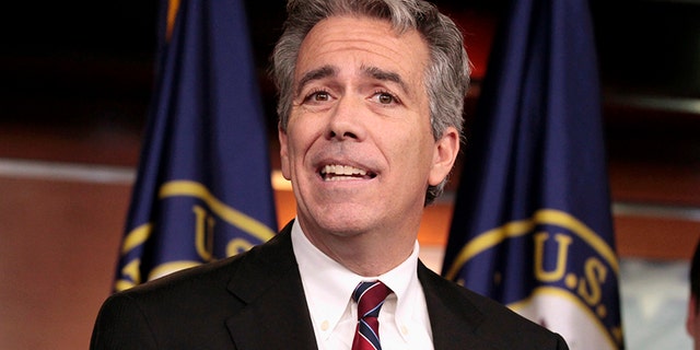 FILE - In this Nov. 15, 2011, file photo former U.S. Rep. Joe Walsh, R-Ill., gestures during a news conference on Capitol Hill in Washington. (AP Photo/Carolyn Kaster, File)