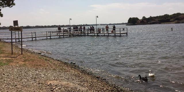 A local alerted authorities after finding a 3-year-old girl alone aboard a vessel on Lake Granbury, pictured.