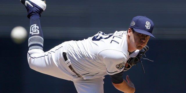 San Diego Padres starting pitcher Cal Quantrill works against a Tampa Bay Rays batter during the first inning of a baseball game Wednesday, Aug. 14, 2019, in San Diego. (AP Photo/Gregory Bull)