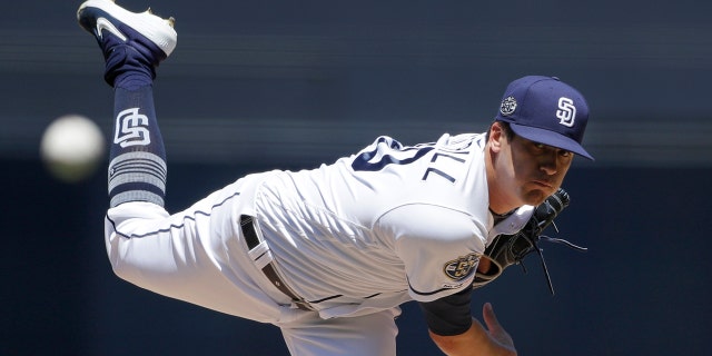 San Diego Padres starting pitcher Cal Quantrill works against a Tampa Bay Rays batter during the first inning of a baseball game Wednesday, Aug. 14, 2019, in San Diego. (AP Photo/Gregory Bull)