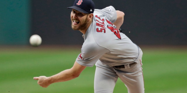 Boston Red Sox starting pitcher Chris Sale delivers in the first inning of the team's baseball game against the Cleveland Indians, Tuesday, Aug. 13, 2019, in Cleveland. (AP Photo/Tony Dejak)
