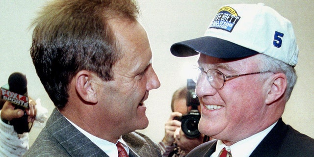 Former Kansas City Royals baseball player George Brett is congratulated by Miles Prentice after Brett was voted into the National Baseball Hall of Fame by the Baseball Writers' Association of America. Prentice nearly bought the Royals. (Photo credit should read DAVID KAUP/AFP/Getty Images)