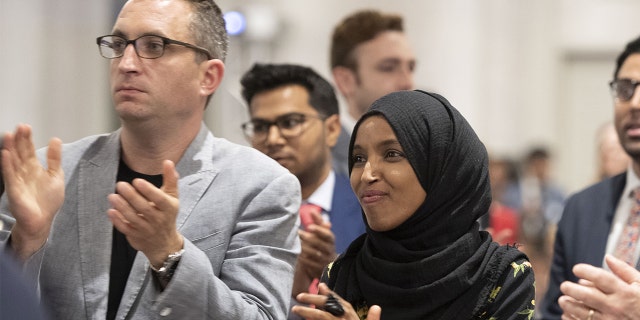 Rep. Ilhan Omar and Tim Mynett in an undated photo.