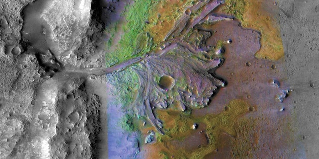 This is the site of the Mars 2020 landing. Chemical Alteration by Water, Jezero Crater Delta: On ancient Mars, water-carved channels and transported sediments to form fans and deltas within lake basins (color enhanced to show mineral types). (Credit: NASA/JPL-Caltech/MSSS/JHU-APL)