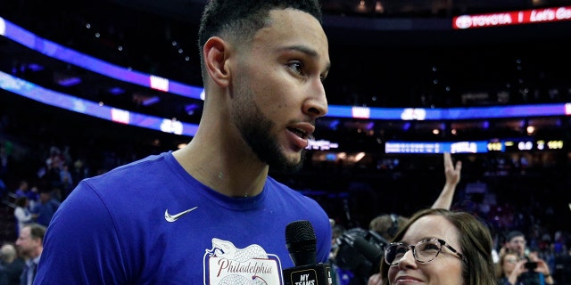 FILE - In this May 9, 2019, file photo, Philadelphia 76ers' Ben Simmons interviewed by 76ers sideline reporter Serena Winters following the second half of Game 6 of a second-round NBA basketball playoff series against the Toronto Raptors, in Philadelphia. (AP Photo/Chris Szagola, File)