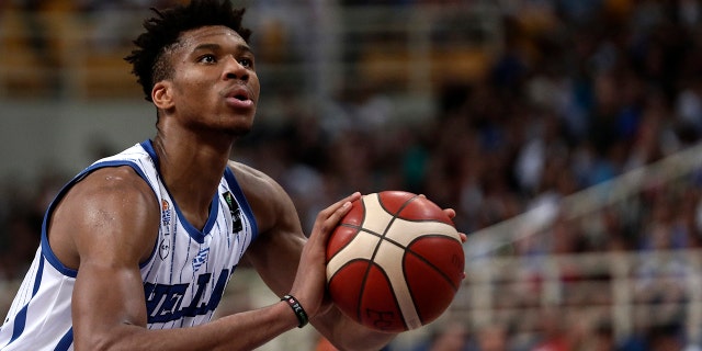 Greece's Giannis Antetokounmpo, of the Milwaukee Bucks, prepares for a free throw, during a game against Italy, at the Acropolis basketball tournament at the indoor Olympic stadium of Athens, Friday, Aug. 16, 2019. (AP Photo/Yorgos Karahalis)
