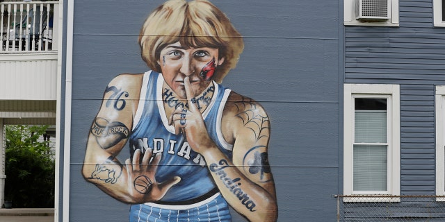 A mural of former NBA star Larry Bird is seen on the side of a multi-family residence in Fountain Square, Wednesday, Aug. 21, 2019, in Indianapolis. (AP Photo/Darron Cummings)