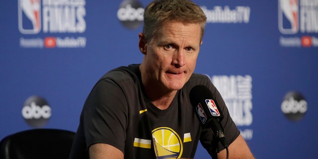 FILE - In this June 5, 2019, file photo, Golden State Warriors head coach Steve Kerr speaks at a news conference after Game 3 of basketball's NBA Finals against the Toronto Raptors in Oakland, Calif. Kerr knows that a new era of Warriors basketball is about to begin. He just doesn't know what that means yet. (AP Photo/Ben Margot, File)