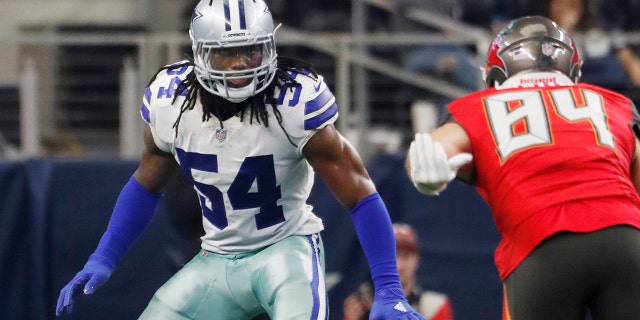 FILE - In this Sunday, Dec. 23, 2018 file photo, Dallas Cowboys linebacker Jaylon Smith against the Tampa Bay Buccaneers during an NFL game in Arlington, Texas. The Dallas Cowboys have given young linebacker Jaylon Smith a new contract while the holdout by Pro Bowl running back Ezekiel Elliott nears a month since the team reported to training camp. Smith’s extension was announced Tuesday, Aug. 20, 2019. (AP Photo/Andy Jacobsohn, File)