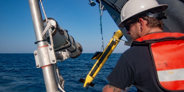 The Kraken towed KATFISH being deployed from NOAA's exploration ship Okeanos Explorer. (Image courtesy of the NOAA Office of Ocean Exploration and Research, 2019 Technology Demonstration.)