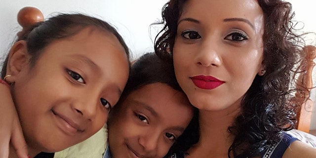Nileshni Kajal, 34, with her daughters, Sana,11, and Samara, 8.