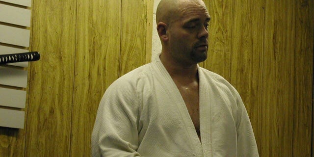 Before he was left paralyzed by a gunman while responding to a call, Maryland County Police Officer Kyle Olinger was active in martial arts.