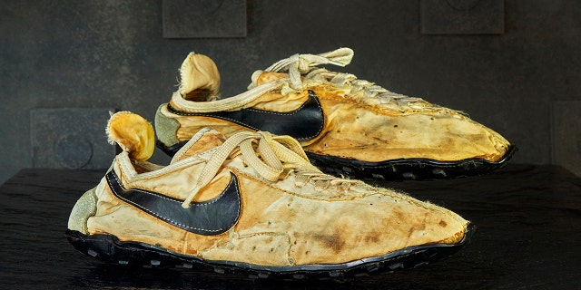 This undated photo provided by Graduate Hotels shows a pair of handmade Nike track shoes from the 1972 Olympic trials. The pair of Nike track shoes has sold for $50,000. (Christian Horan/Graduate Hotels via AP)