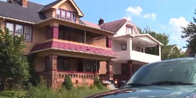 The woman said she went to a party in the home on Sunday, and woke up Tuesday in a freezer, according to police.