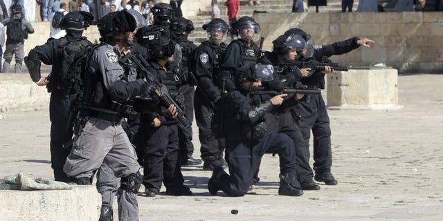 Several dozen Jewish people entered the site under close police escort and Muslim worshippers began throwing chairs and other objects at them. Jewish visitors left the compound shortly thereafter.
