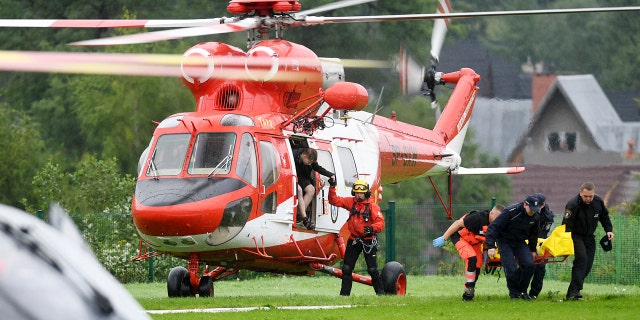 A rescue helicopter with some of the victims Thursday.