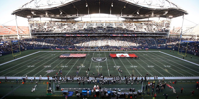 U.S. and Canadian flags are presented on the field before an NFL preseason football game between the Green Bay Packers and the Oakland Raiders on Thursday, Aug. 22, 2019, in Winnipeg, Manitoba. (Associated Press)