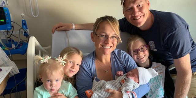 Millerbernd, a Navy Master at Arms, was racing toward the hospital with his wife when her water broke.