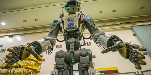 In this photo taken on Friday, July 26, 2019, and distributed by Roscosmos Space Agency Press Service, the robot is seen before being loaded into the Soyuz capsule.