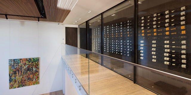 The main residence boasts equally enviable amenities with five bedrooms, 6.5 bathrooms, plus an art gallery, wine cellar and entertainment room.