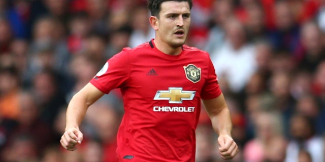Manchester United's Harry Maguire controls the ball during the English Premier League soccer match between Manchester United and Chelsea at Old Trafford in Manchester, England, Sunday, Aug. 11, 2019. (AP Photo/Dave Thompson)