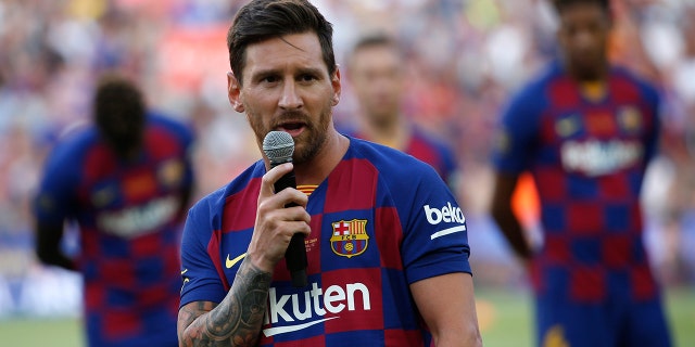Barcelona forward Lionel Messi addresses the crowd prior of the Joan Gamper trophy soccer match between FC Barcelona and Arsenal at the Camp Nou stadium in Barcelona, Spain, Sunday, Aug. 4, 2019. (AP Photo/Joan Monfort)