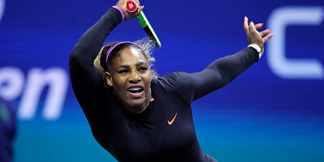 Serena Williams returns to Maria Sharapova during the first round of the U.S. Open tennis tournament in New York City, Aug. 26, 2019. (Associated Press)