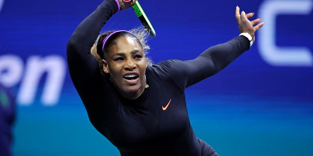 Serena Williams returns to Maria Sharapova during the first round of the U.S. Open tennis tournament in New York, Monday, Aug. 26, 2019. (AP Photo/Charles Krupa)