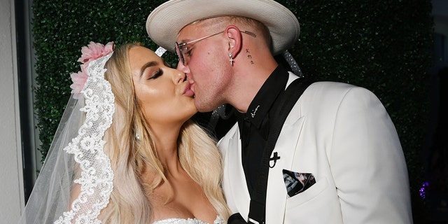 Jake Paul and Tana Mongeau at their wedding at Graffiti House on July 28, 2019 in Las Vegas, Nevada.