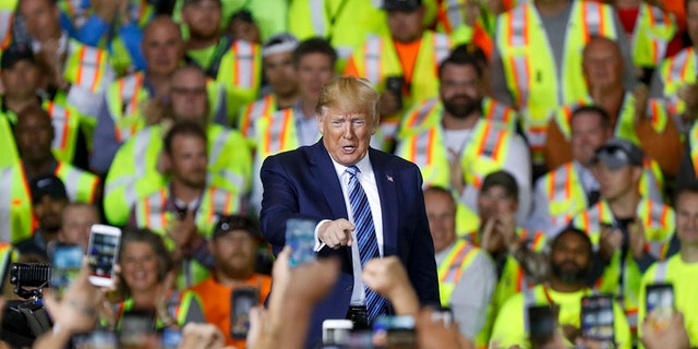 President Donald Trump arrives to speak at the Pennsylvania Shell ethylene cracker plant on Tuesday, Aug. 13, 2019 in Monaca, Pa.(AP Photo/Keith Srakocic)