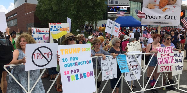 Anti-Donald Trump protests outside of the Southern New Hampshire University Arena in Manchester, NH, ahead of the president's rally, on Thursday August 15, 2019