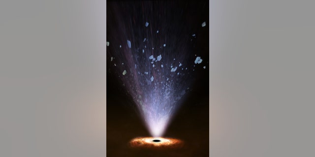 Artist's impression showing how ultrafast winds blowing from a supermassive black hole interact with interstellar matter in the host galaxy, clearing its central regions from gas. (Credit: ESA/ATG medialab)