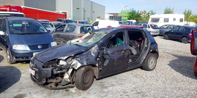In this undated photo taken by her son, the automobile of Marie Corine Bastide is parked in a lot in Liège, Belgium. Bastide, who was involved in a car accident on the night of July 23, 2019, during one of Belgium's record-breaking heat waves, survived for six days in her wrecked car in a ditch before being rescued.